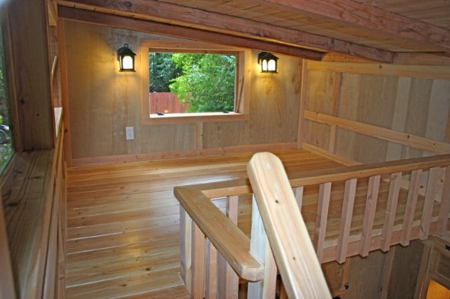 Deck on the Hunter Green Cabin by Molecule Tiny Homes