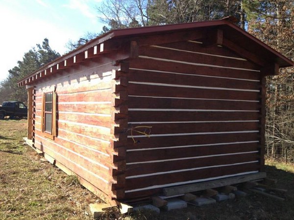 This $21,000 Log Cabin Is a Portable Rustic Gem {For Sale}