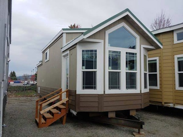 This Roomy Tiny House Features Big Windows and Plenty of Storage Space