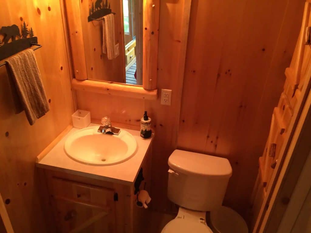 Cabin bathroom with white sink