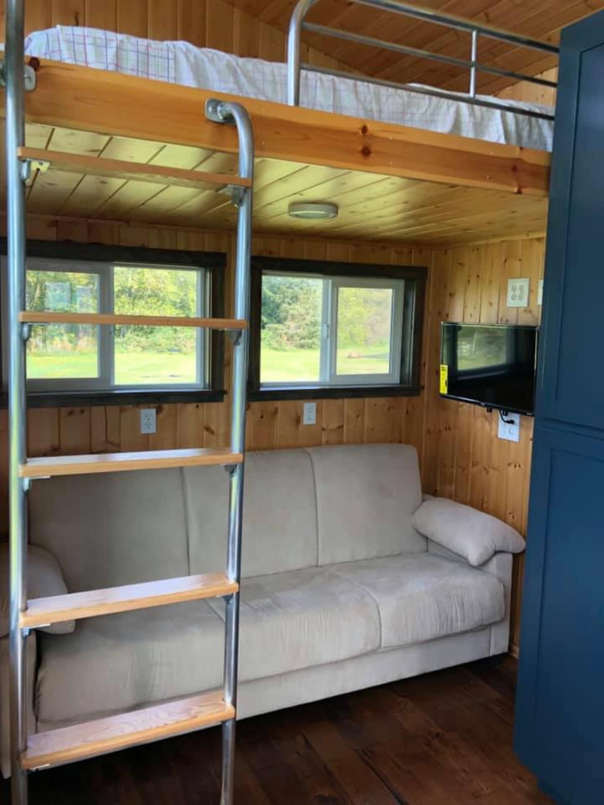 Couch and windows in tiny house