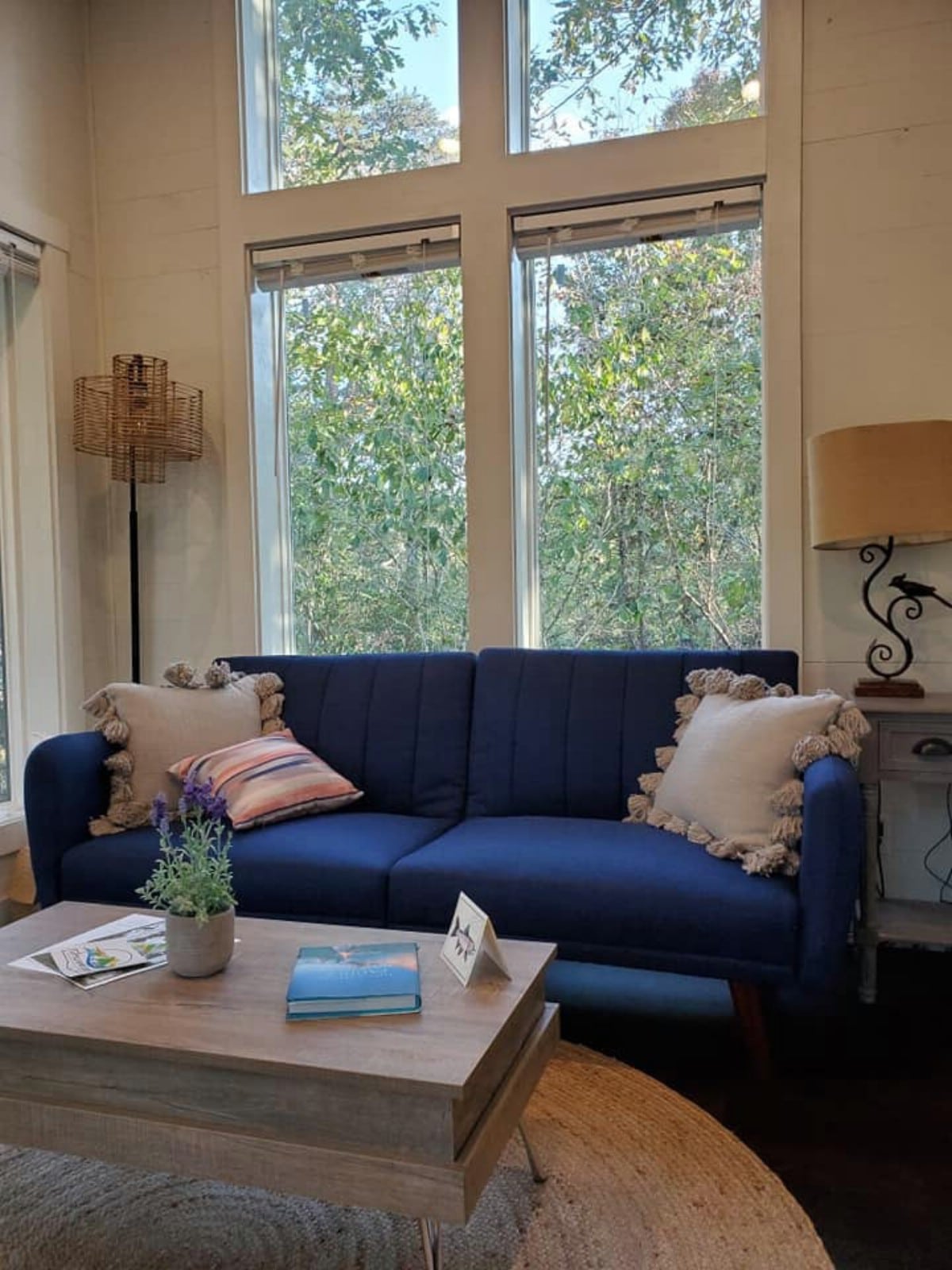 Couch in front of windows