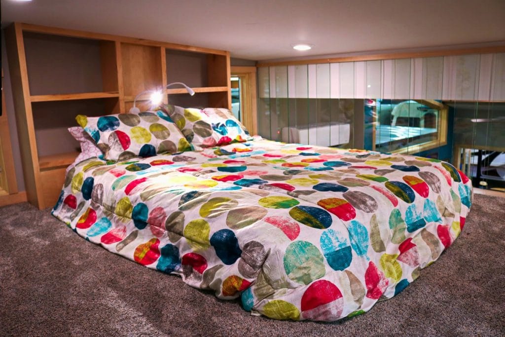 Loft bedroom with polka dot bedding