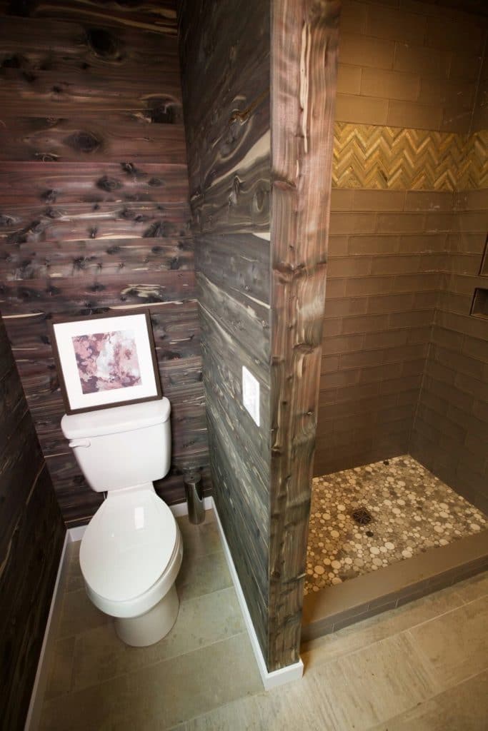 The Fairchild bathroom with wood walls