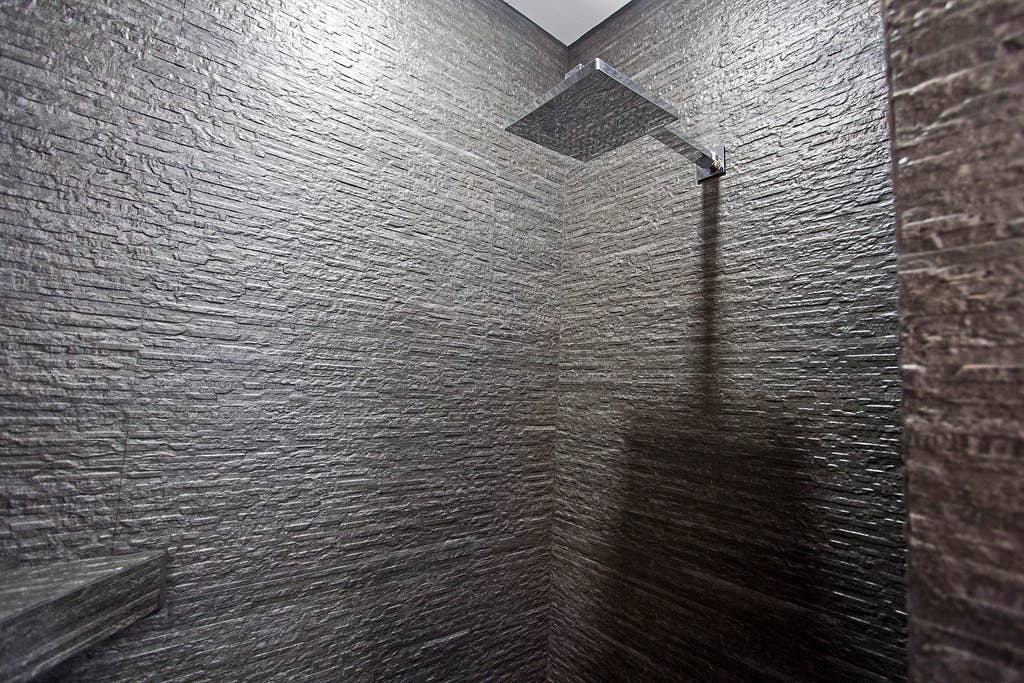 Spa shower with grey tile
