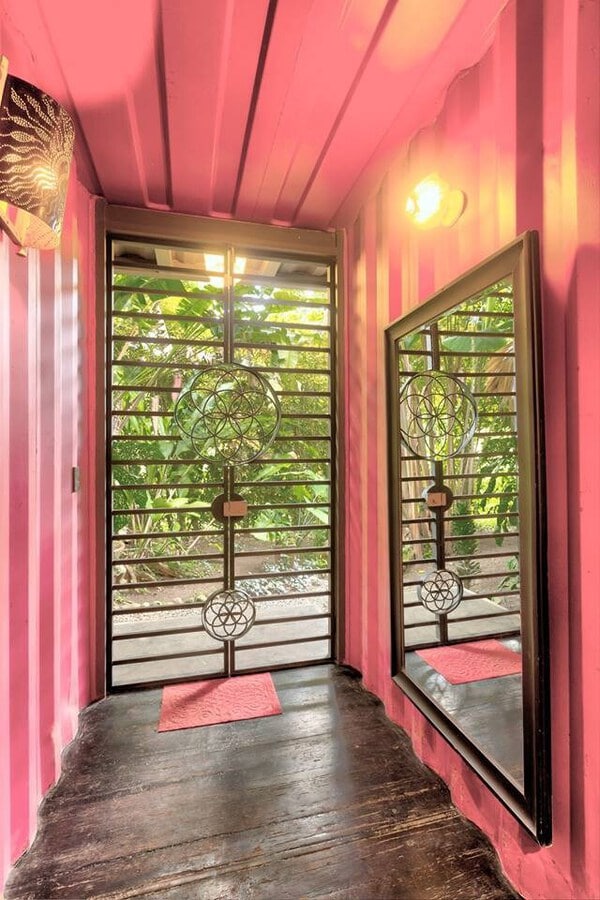 Hallway with pink walls