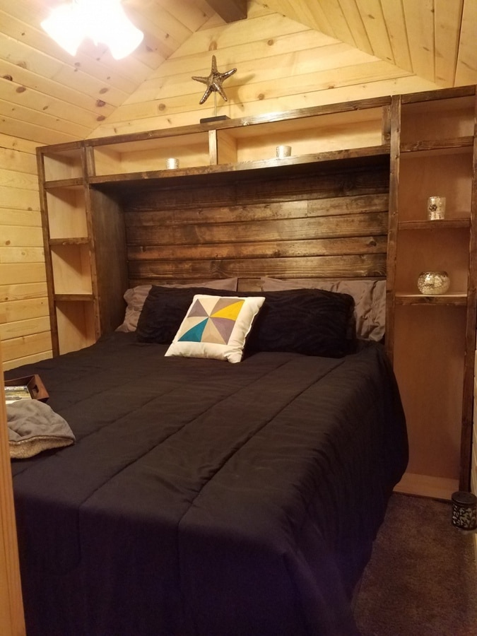 Bed with built in shelving