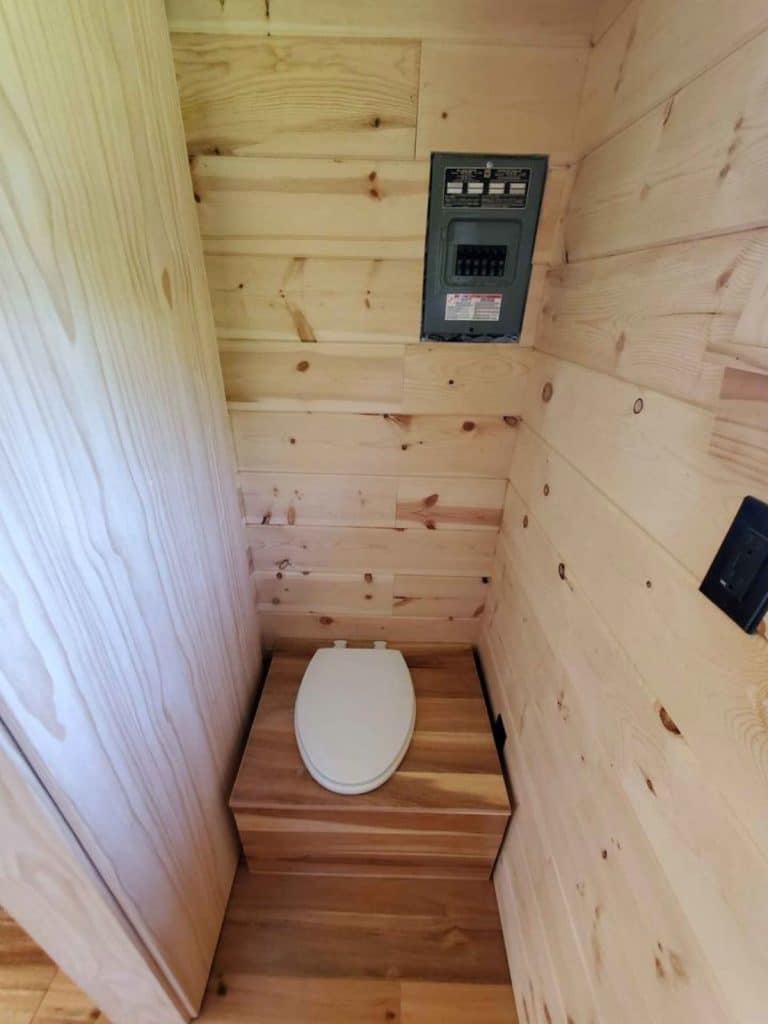 Compost toilet with wood walls