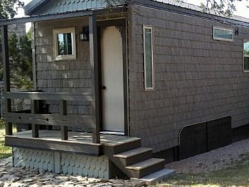 Tiny house with porch and awning