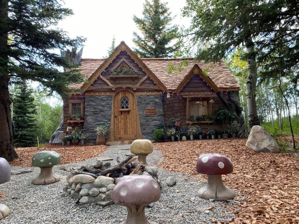 Fairy cottage with toad stools in front