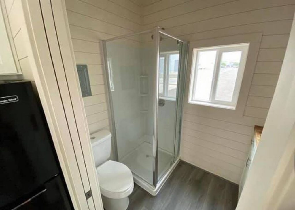 Square glass shower in tiny house