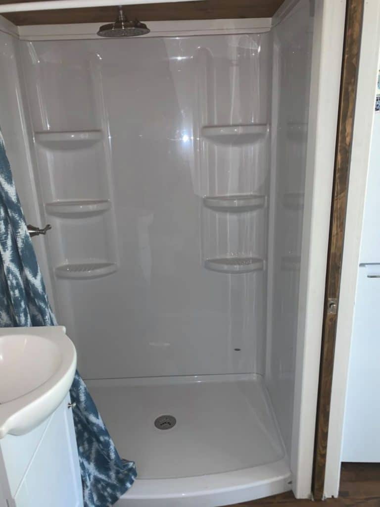 Large white shower stall