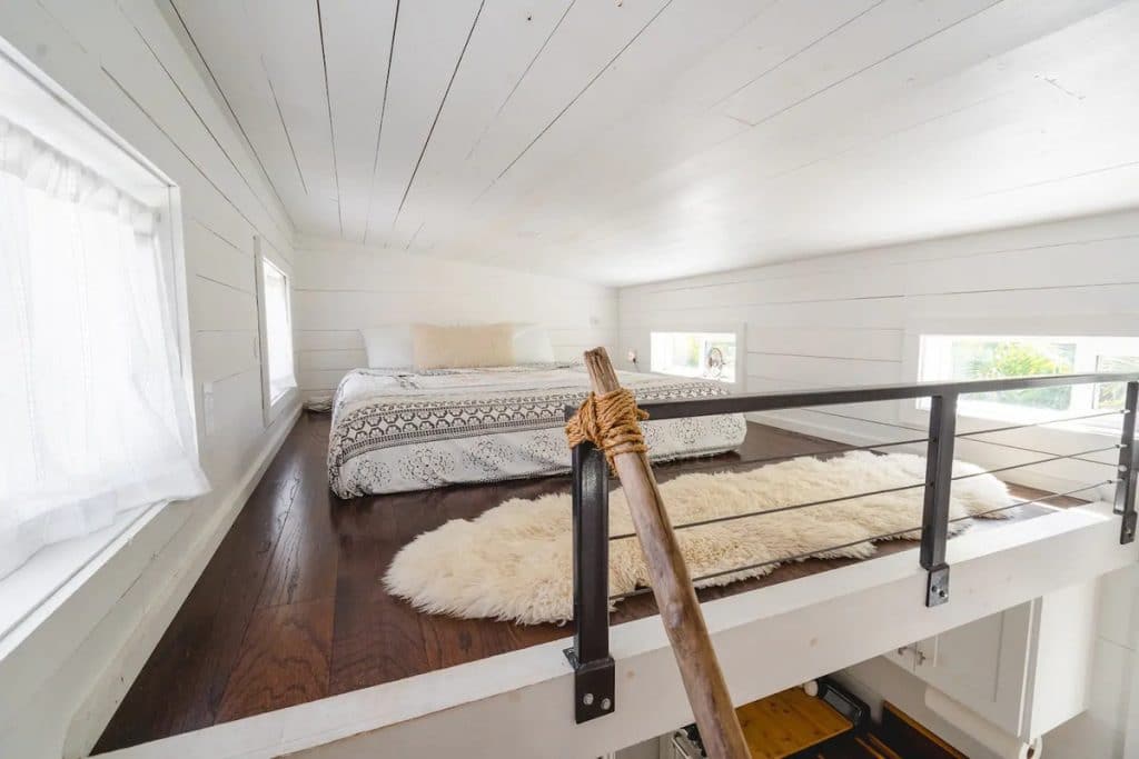 Loft bedroom with rug