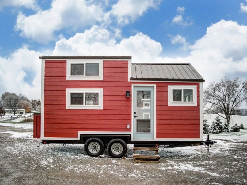 Red tiny house on wheels