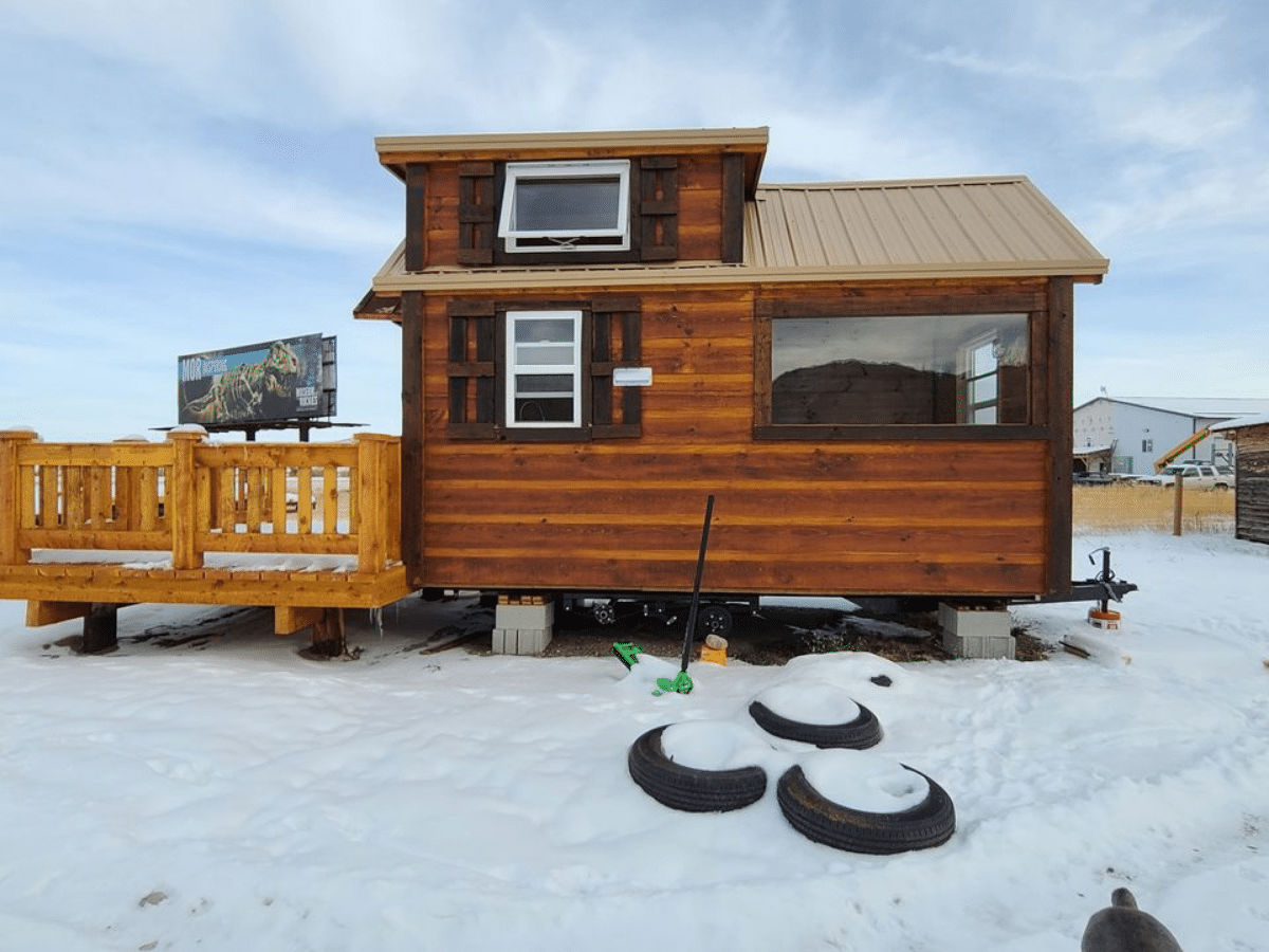 This Freedom Style Tiny  House  is a Miniature Cabin  on Wheels 