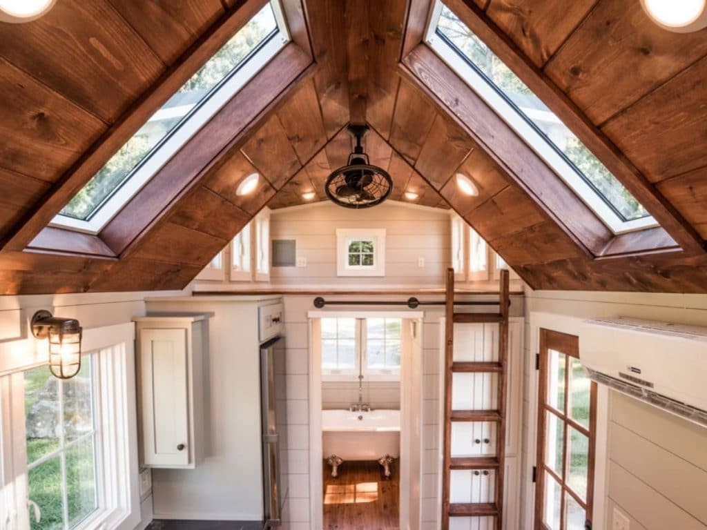 Tiny house loft with wood ceiling