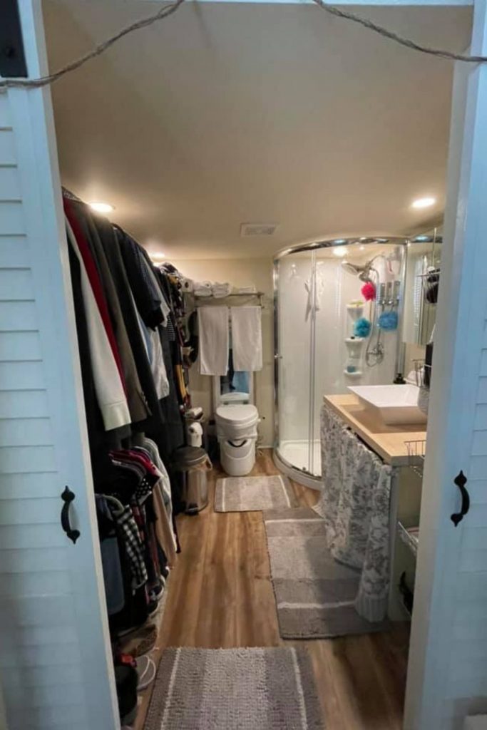 Luxury tiny bathroom with closet and shower