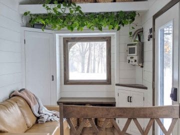 White shiplap walls in living space of tiny home