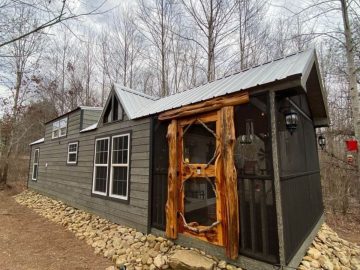 Tiny house cabin with wood door