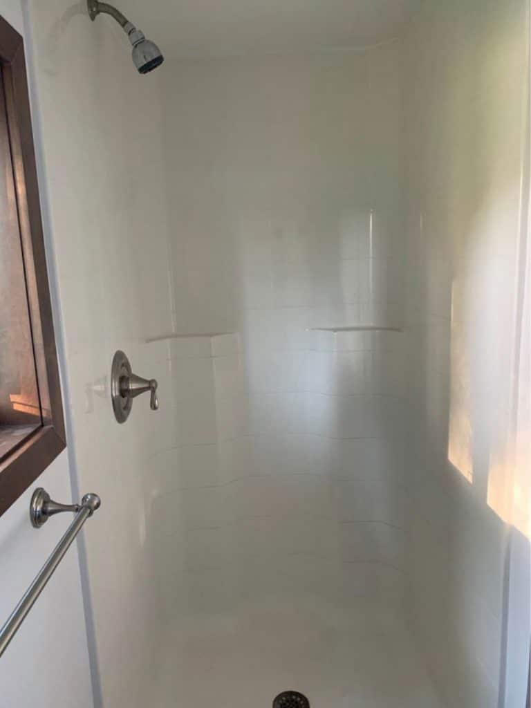 White tiled shower stall