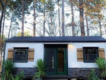 White tiny house with charcoal trim