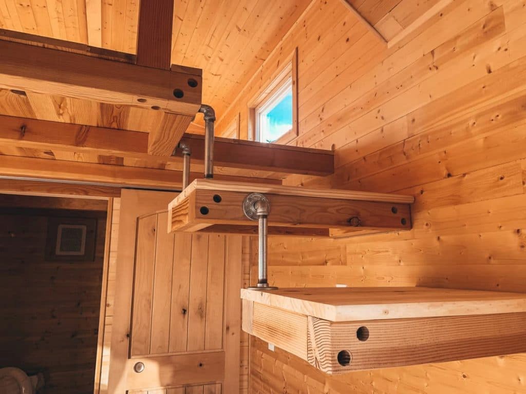 Natural pine floating stairs with metal hardware