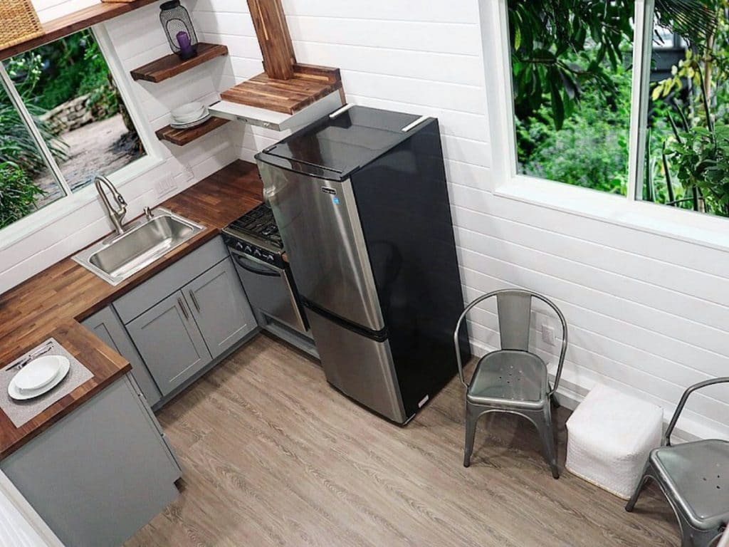 Tiny house kitchen with stainless steel appliances