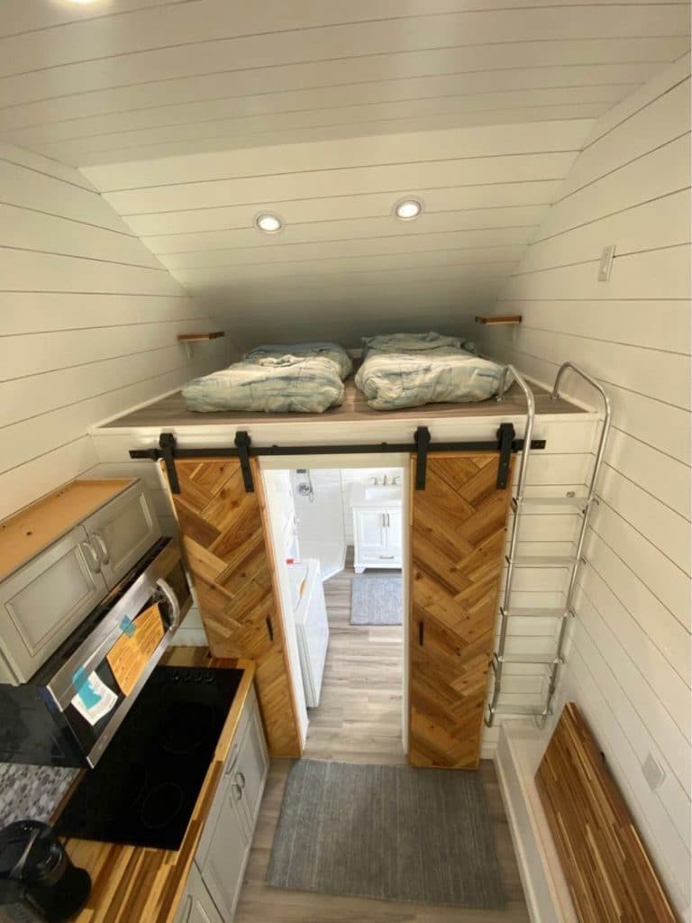Loft above bathroom with low ceilings