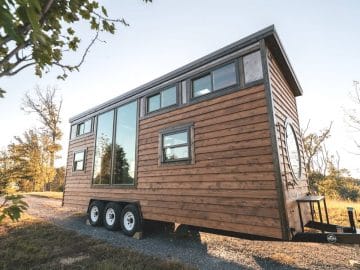 Rustic brown siding tiny home on wheels