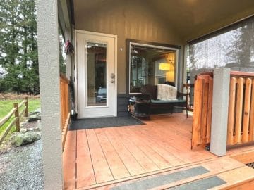 Front porch of tiny home with cedar planks
