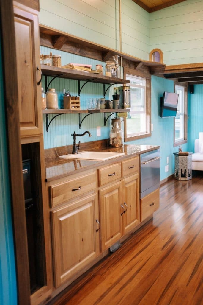 Tiny kitchen with wood cabinets