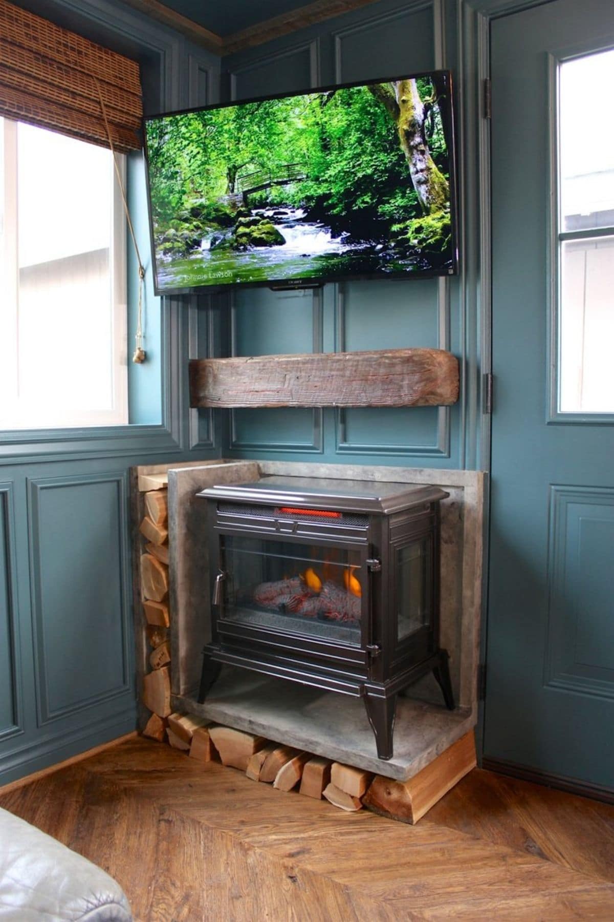 Fireplace on top of wooden shelf with wood logs around the side and bottom