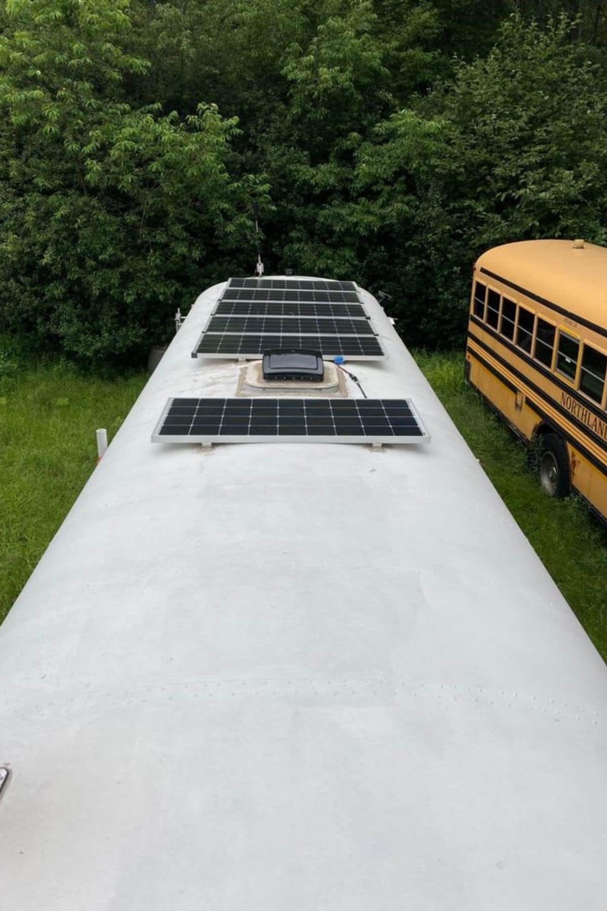 Solar panels mounted on top of skoolie