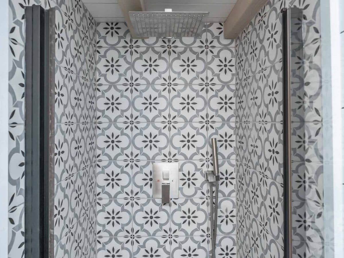 White and blue tile in shower