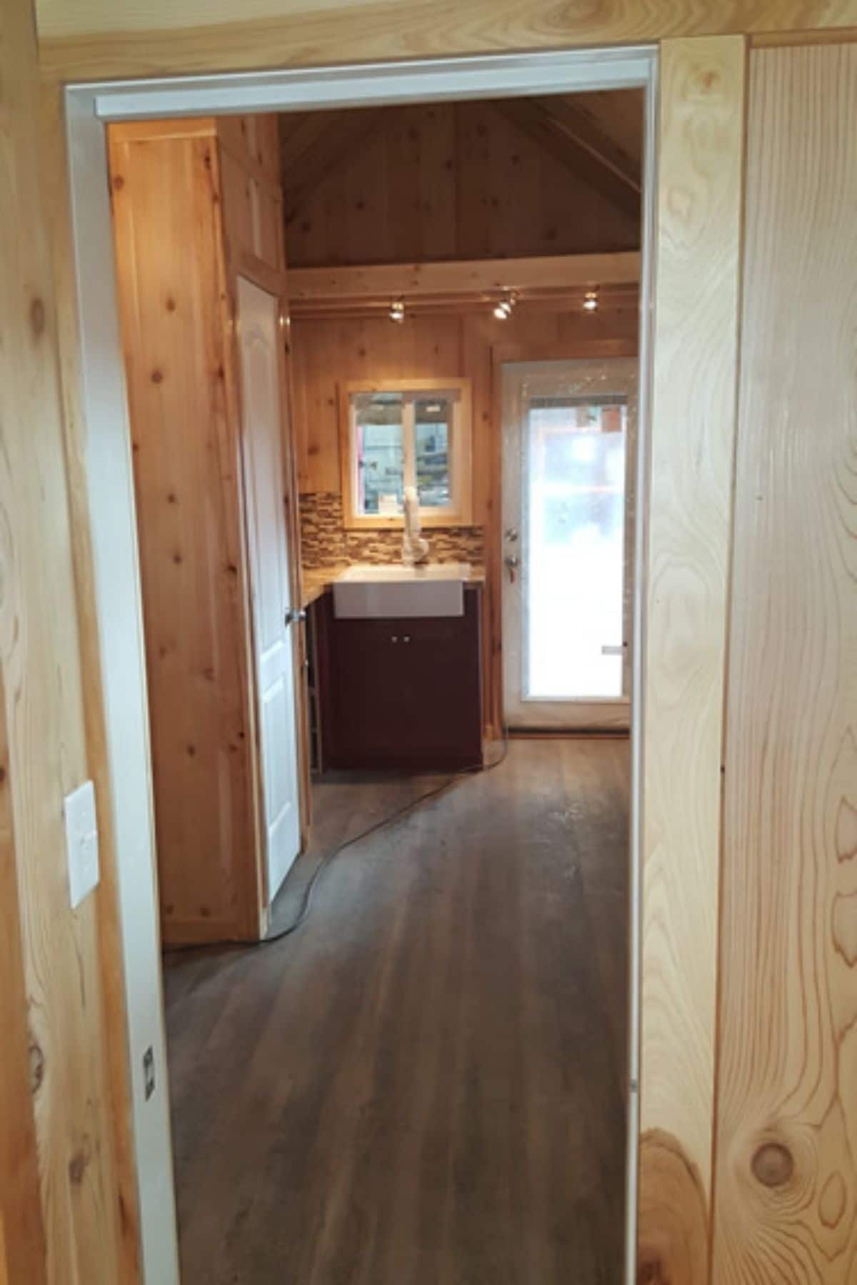 View from door into corner kitchen in tiny house