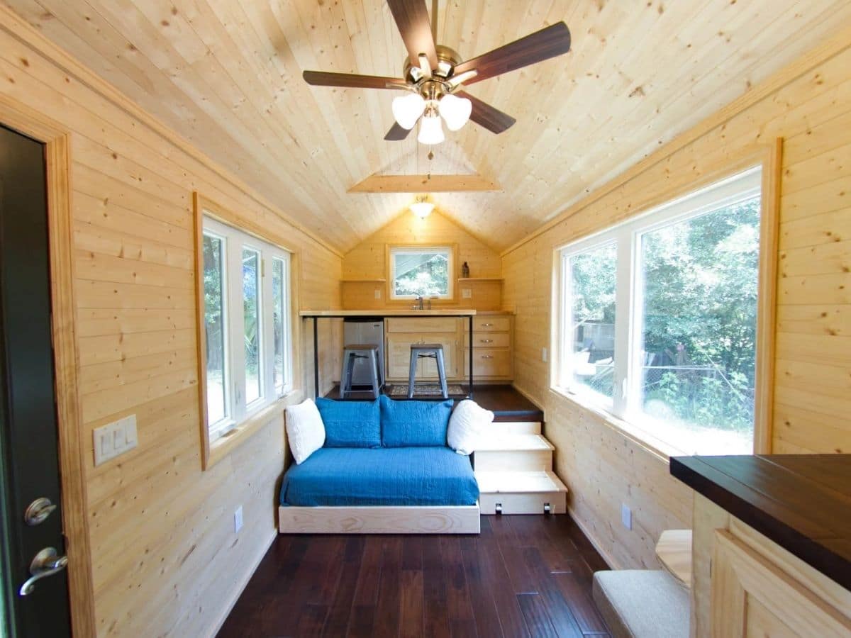 Tiny home living room with light wood walls and ceiling