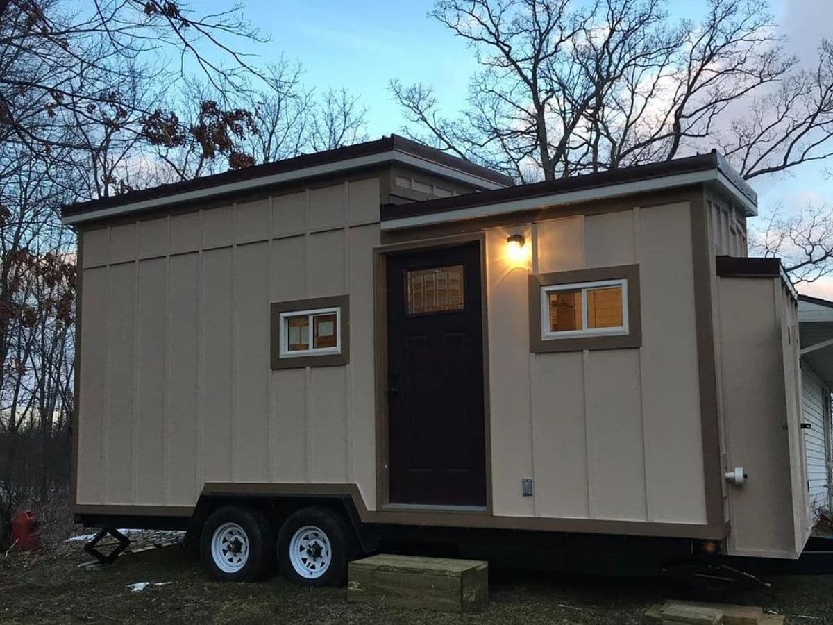 cream and brown tiny house on wheels