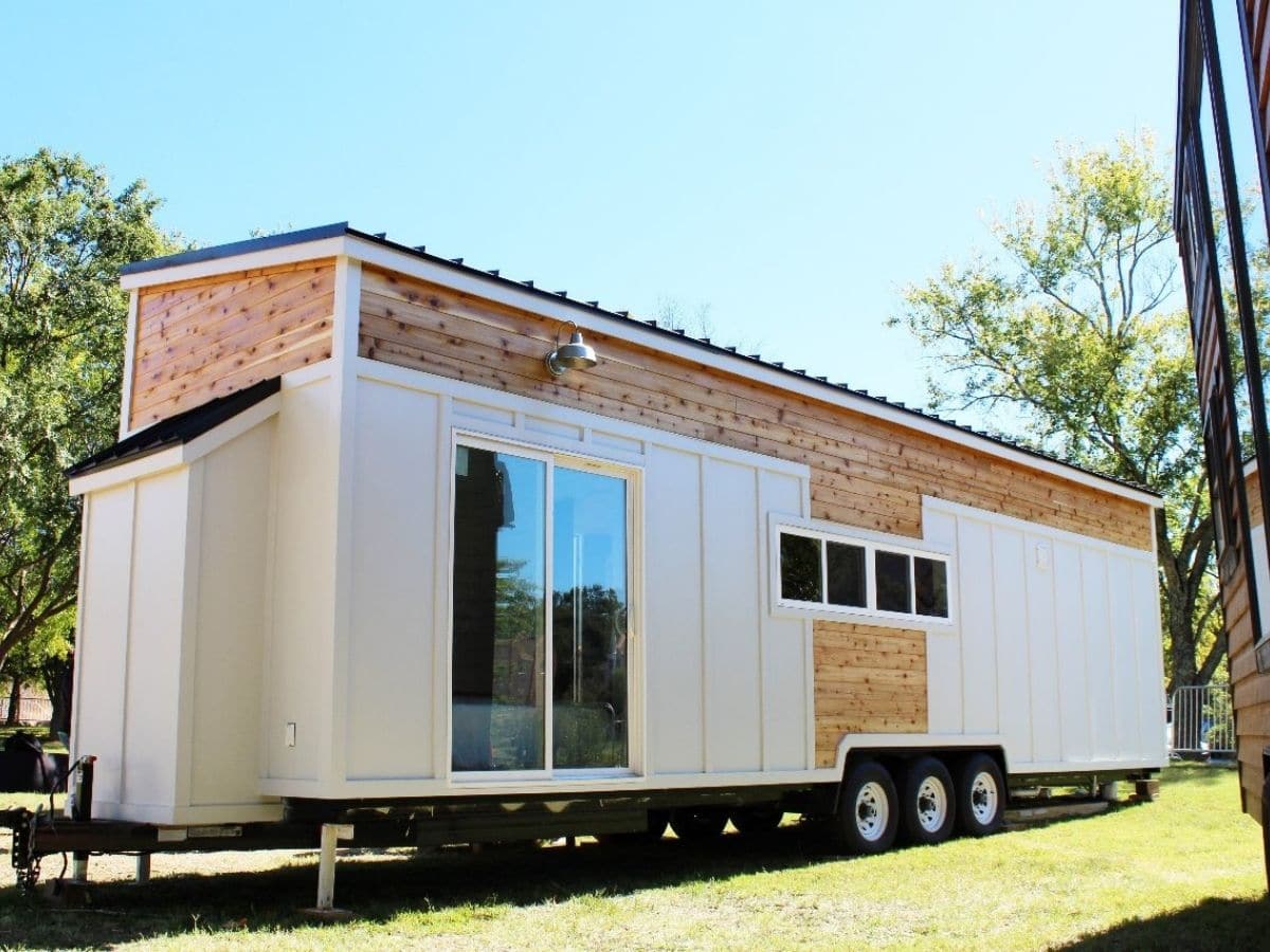 side of tiny home with ceram and wood siding