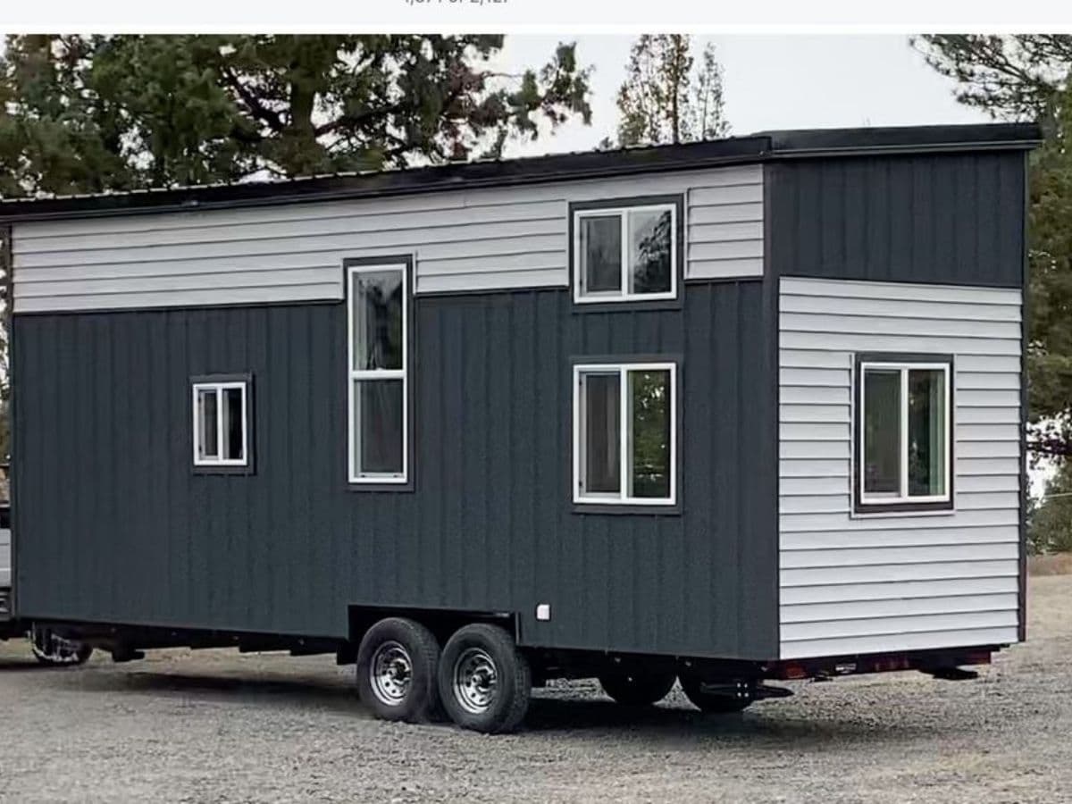 two tone blue tiny home on wheels
