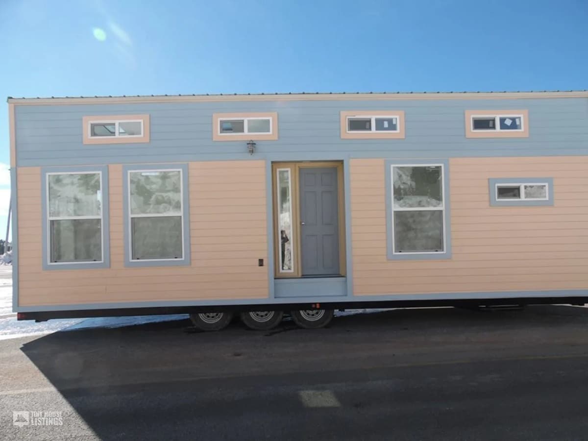 Container ban themed tiny home on wheels