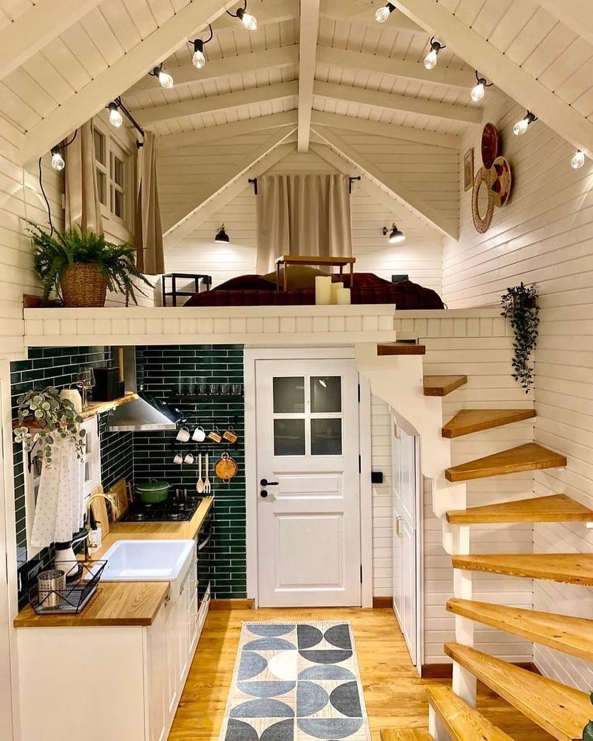 Sleek white loft style tiny house