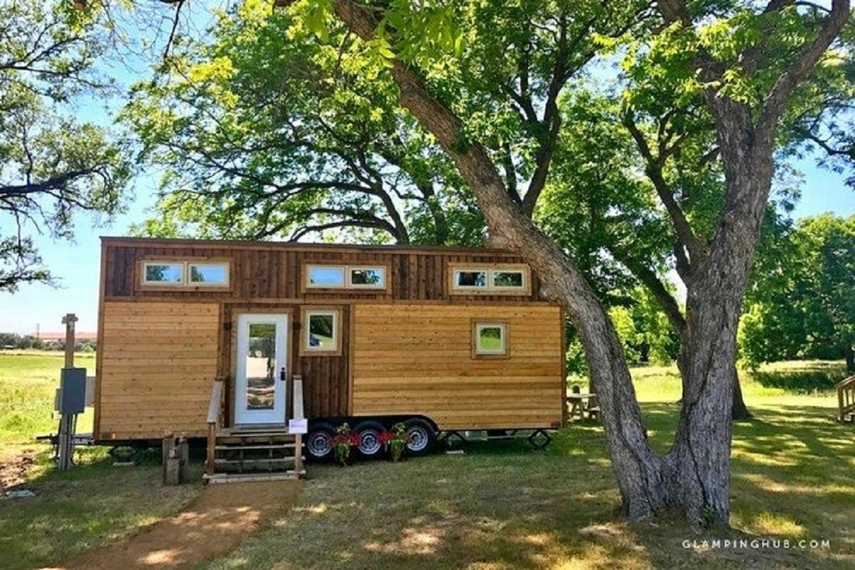 Parked tiny house on wheels