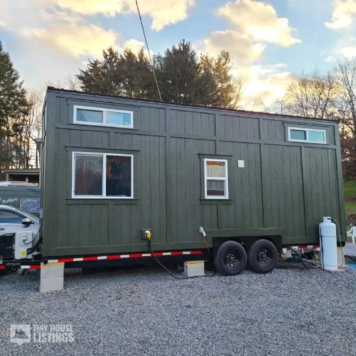 Wild olive green tiny home on wheels