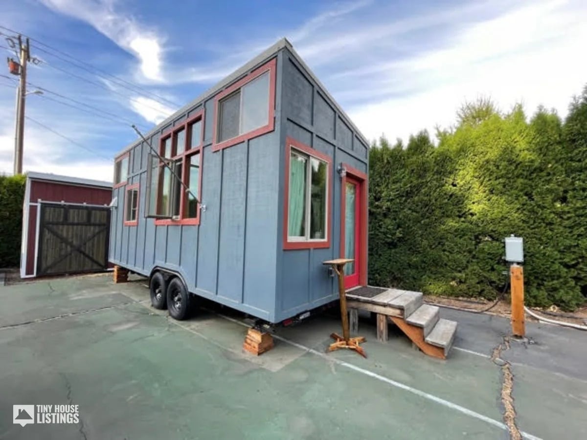 Blue with red accents tiny house