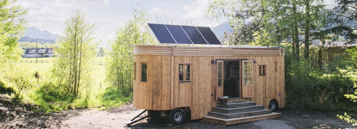 Wooden Mobile home with wheels and solar panels
