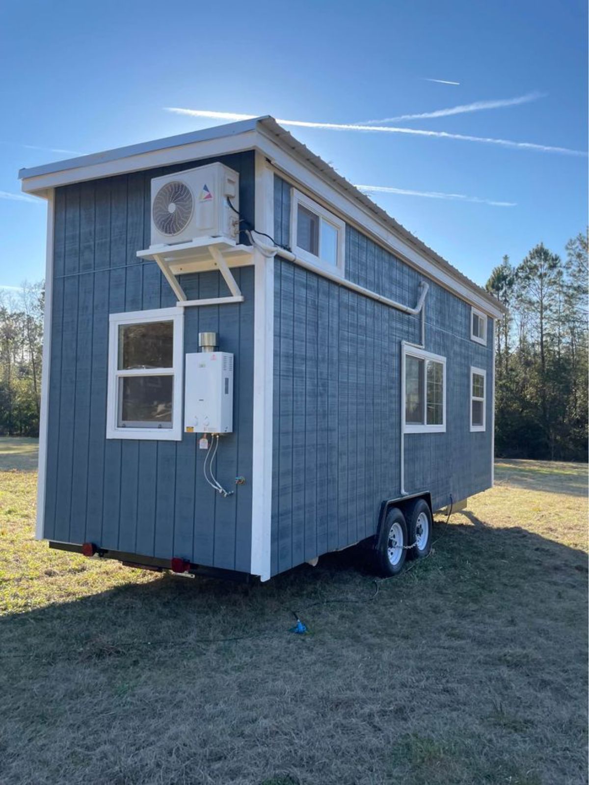 24' house on wheels parked on the grounds