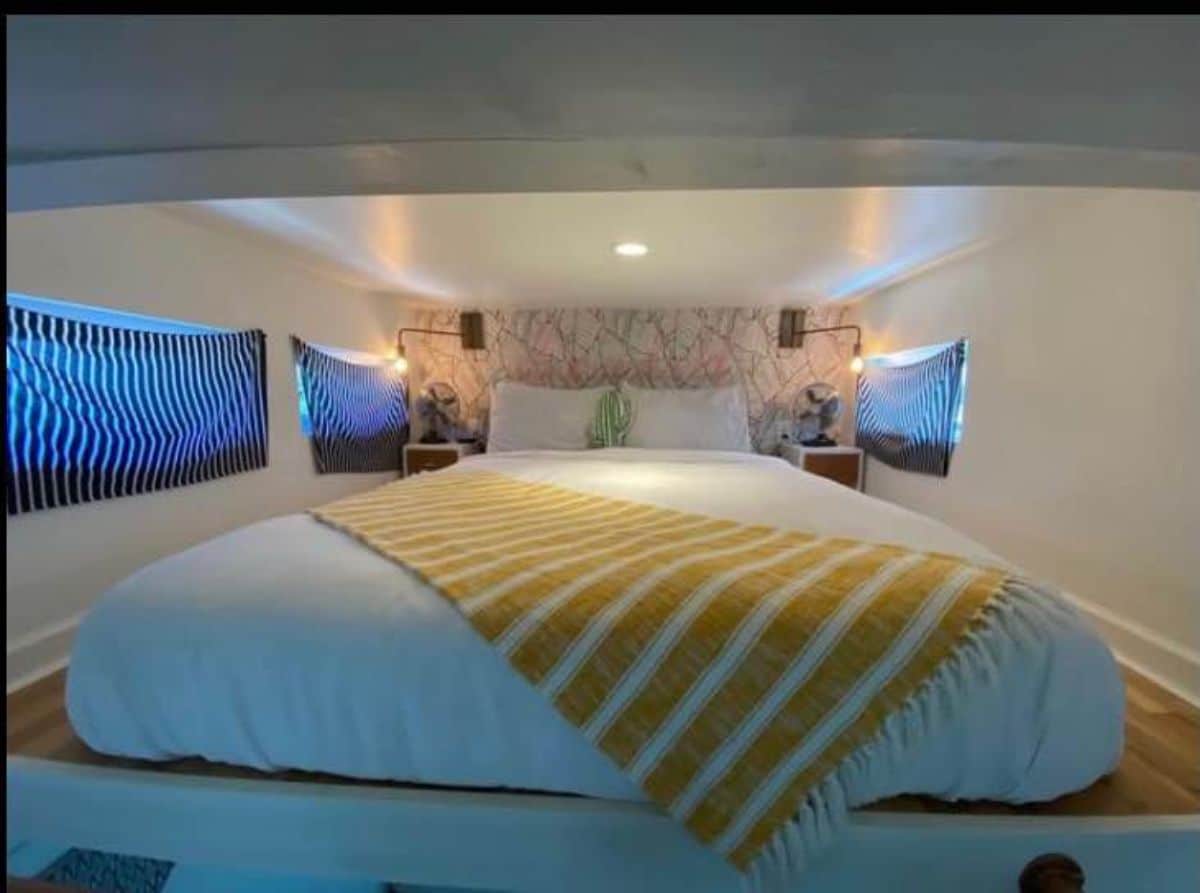 Loft 1 has a king size bed with side tables and LED lights and is accessible through the stairs