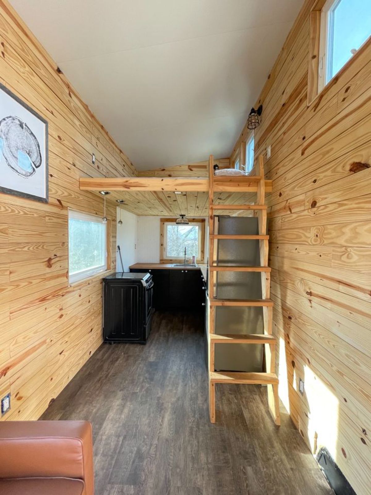 Master bedroom is accessible through the ladder
