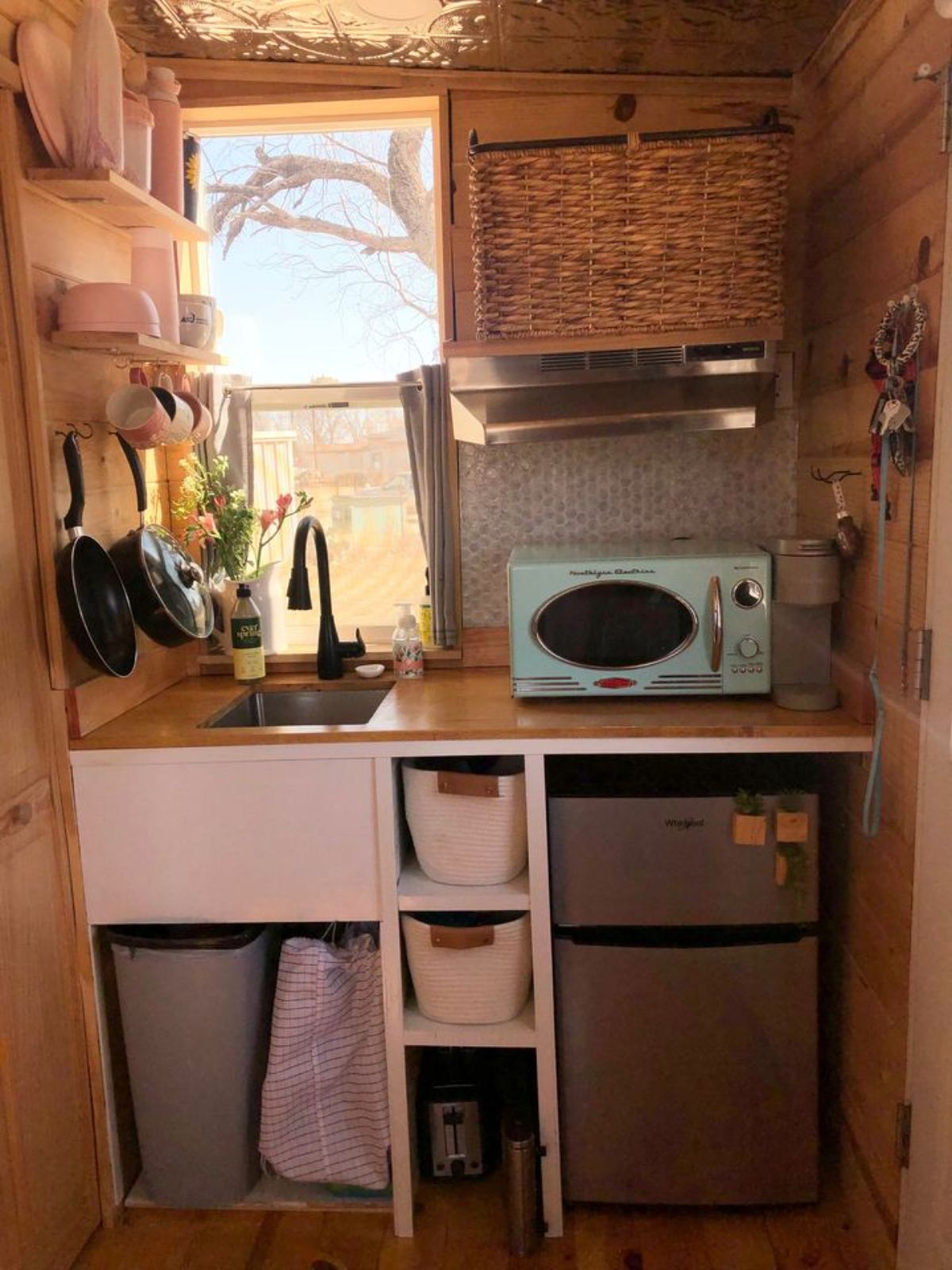 tiny kitchen with a little window