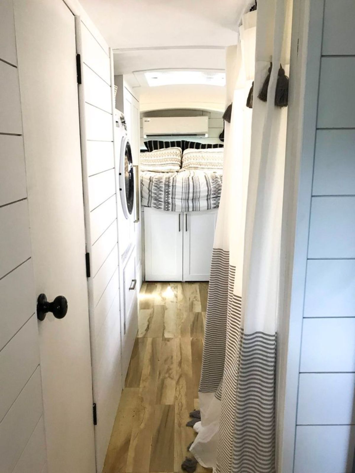 Entrance of bedroom with king sized mattress and closet
